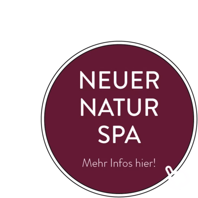 Runder bordeauxroter Button mit der Aufschrift Neuer Natur Spa – Mehr Infos hier
